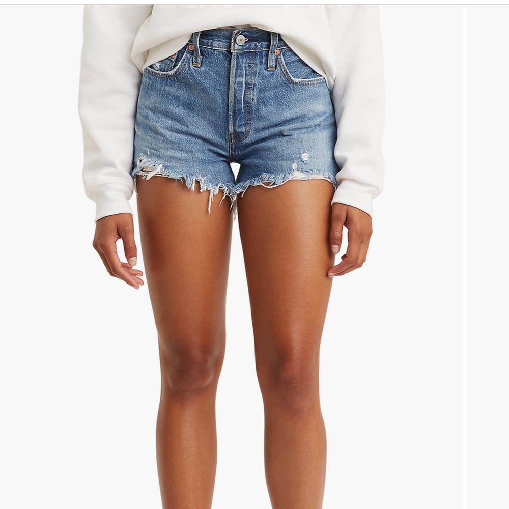 Levi 501 original cutoff denim shorts. Medium wash with distressing. Size 28.